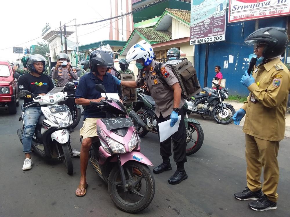 SOSIALISASI SOCIAL DISTANCING