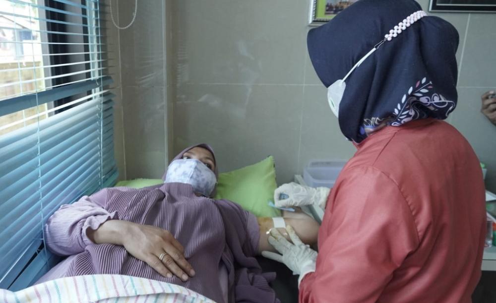 PEMASANGAN IMPLAN KB