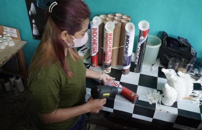 PENYELESAIAN PEMBUNGKUSAN SHUTTLECOCK