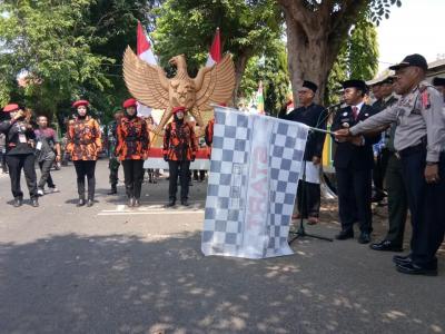 peringati-hari-kesaktian-pancasila-ribuan-anggota-ormas-gelar-kirab-merah-putih